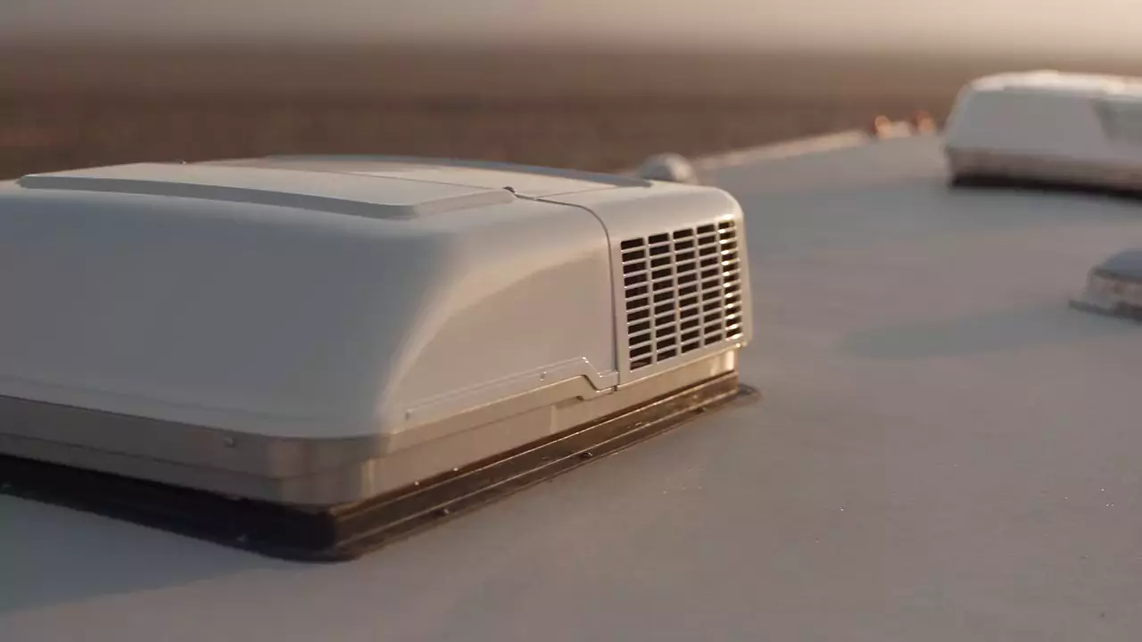 Rooftop air conditioner unit on an RV roof